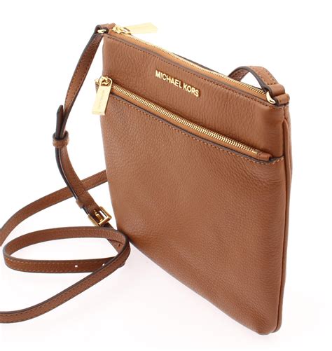 michael kors crossbody purses used.